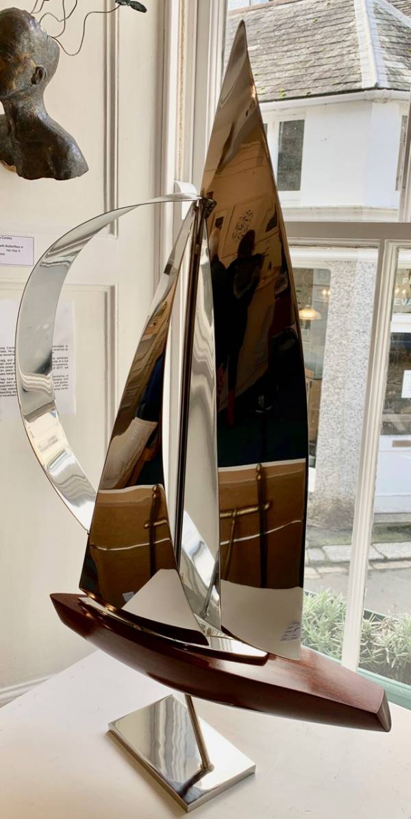 - a Sculpture by John Mellows, measuring 79 x 45 cm (H x W) £875